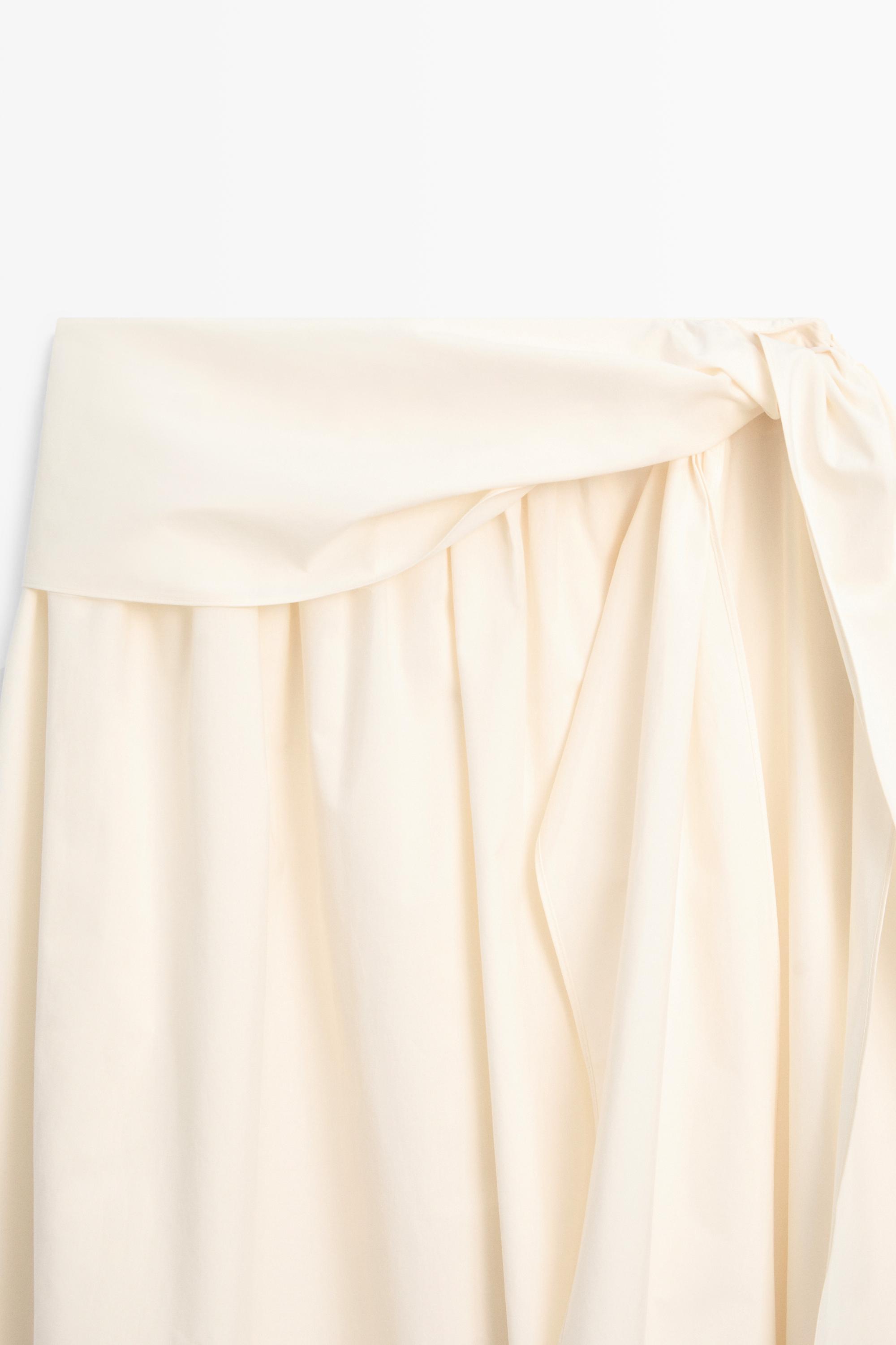 Flowing skirt with scarf detail